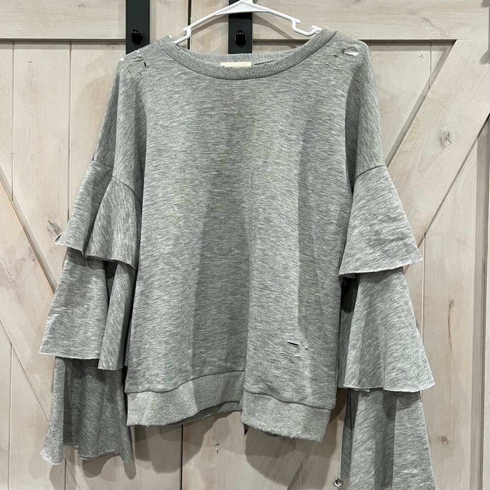 Vestique flared sleeve lightweight sweater.
